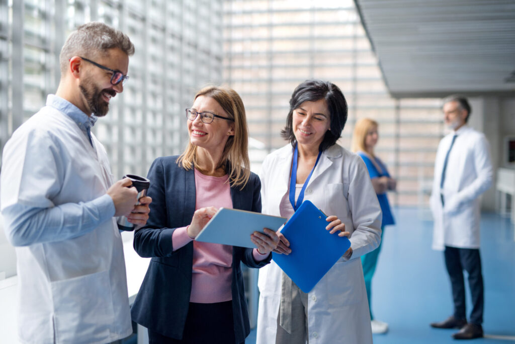 Clinicians talking and smiling