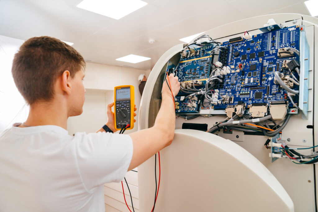 Engineer with voltage tester