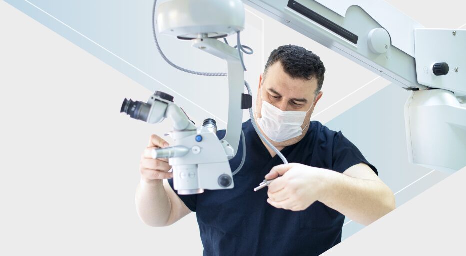 Guy fixing medical devices in mask HTM